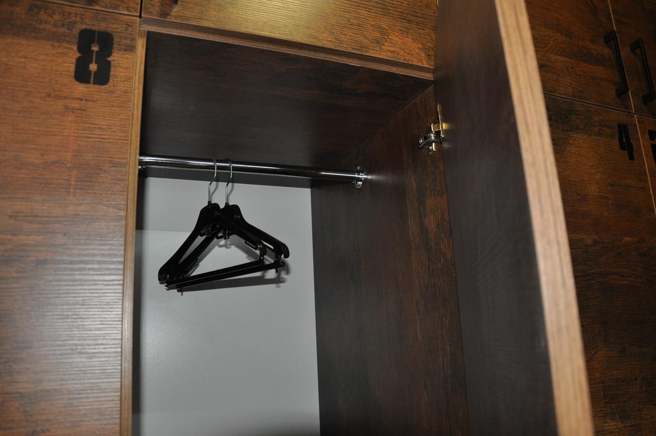 Full House Capsule Hostel Rivne Eksteriør billede A coat hanger in a wardrobe